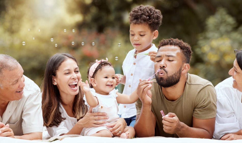 family blowing bubbles